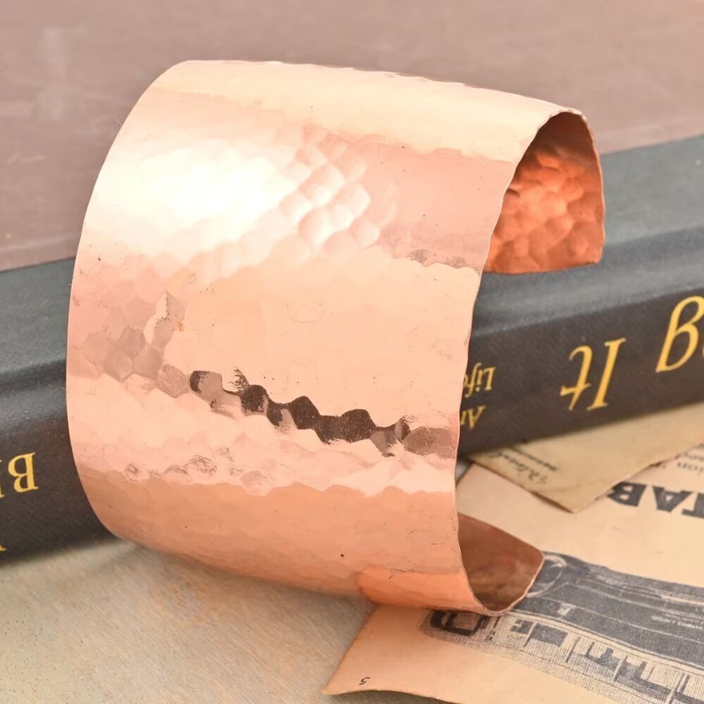 A Large Hammered Cuff Bracelet in Rosetone over Brass - 7 Inches